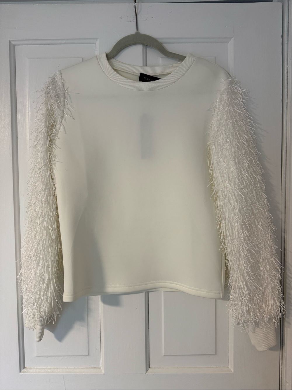 Crewneck Long Sleeve Shirt with Tassel Trim Sleeves
